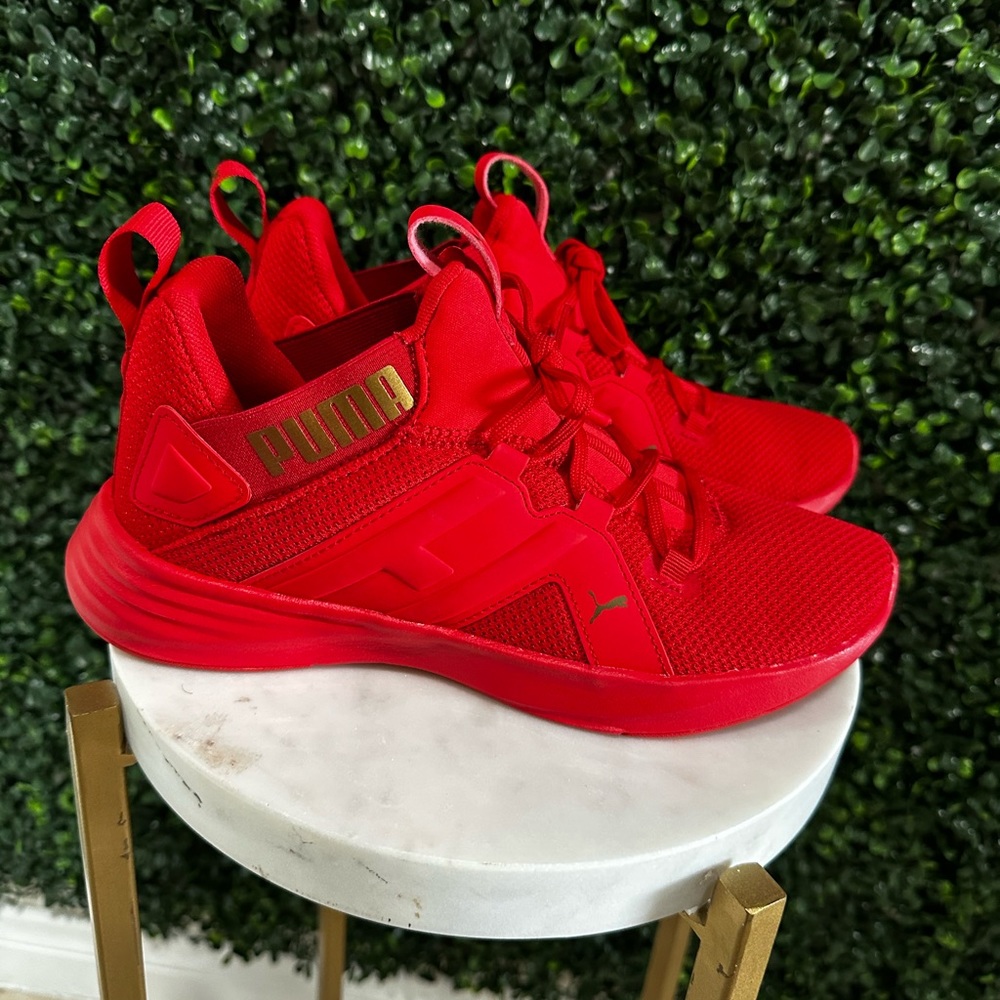 Woman’s Contempt Demi 'High Risk Red Gold Pumas. Size 6.5